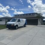 Exclusive Cooling Solutions service van at Cape Coral FL home — same day HVAC service
